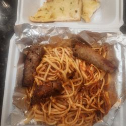 Slim's Place - Two sausages sliced in half and no meatballs and sparsely any sauce! $24. 95 Seriously!