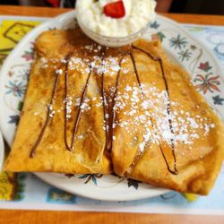 Au Petit Coin Breton - Crepe with strawberries and chocolate with side of whipped yogurt