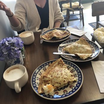 La Petite Crêperie - A cappuccino, a latte, and one of each: Salmon, veggie, and blackberry and lemon curd crepes. - Creperies Near Me - Parker, Colorado La Petite Crêperie - A cappuccino, a latte, and one of each: Salmon, veggie, and blackberry and lemon curd crepes. - Creperies Near Me - Parker, Colorado