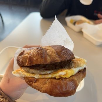 Daylight Restaurant & Bakery - Fresh Cracked Egg Sandwich on a Croissant,  Sausage, Egg and Cheese - Coffee & Tea Near Me - Hilliard, Ohio