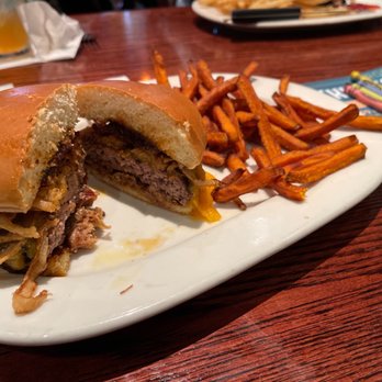 Houlihan's - a hamburger and fries on a plate - New American Near Me - Brick Township, New Jersey Houlihan's - a hamburger and fries on a plate - New American Near Me - Brick Township, New Jersey