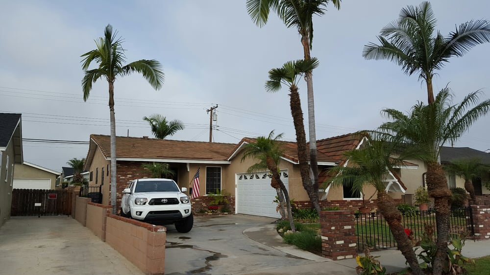 Slide of OC Stay Dry Roofing Company