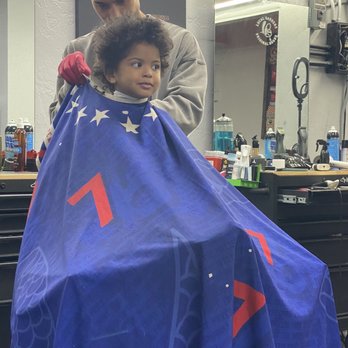 Local Barbers Private Club - My son getting prepped for his first hair cut - Barbers Near Me - Long Beach, California Local Barbers Private Club - My son getting prepped for his first hair cut - Barbers Near Me - Long Beach, California