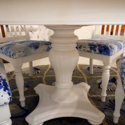 Strip Joint - Base of our dining room table with surrounding chairs. Nice legs!