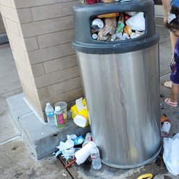 This in front of Target on a Sunday afternoon,  not an uncommon occurrence.  How difficult is it to check the trash occasionally?
