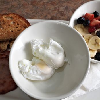 Eggsmart - 2 poached eggs, sourdough toast, smoked ham and fruit bowl - Breakfast & Brunch Near Me - Richmond Hill, Ontario