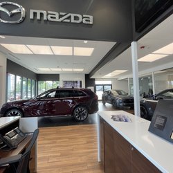 Suburban Mazda of Farmington Hills - Inside/show room.
