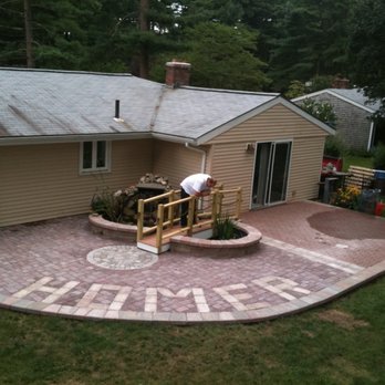 Clearwater Ponds - Personalized patio with koi pond - Landscaping Near Me
