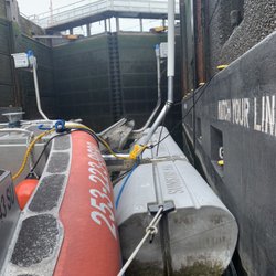 Swift-Justice Marine Towing - Towing a boat lift through the locks.