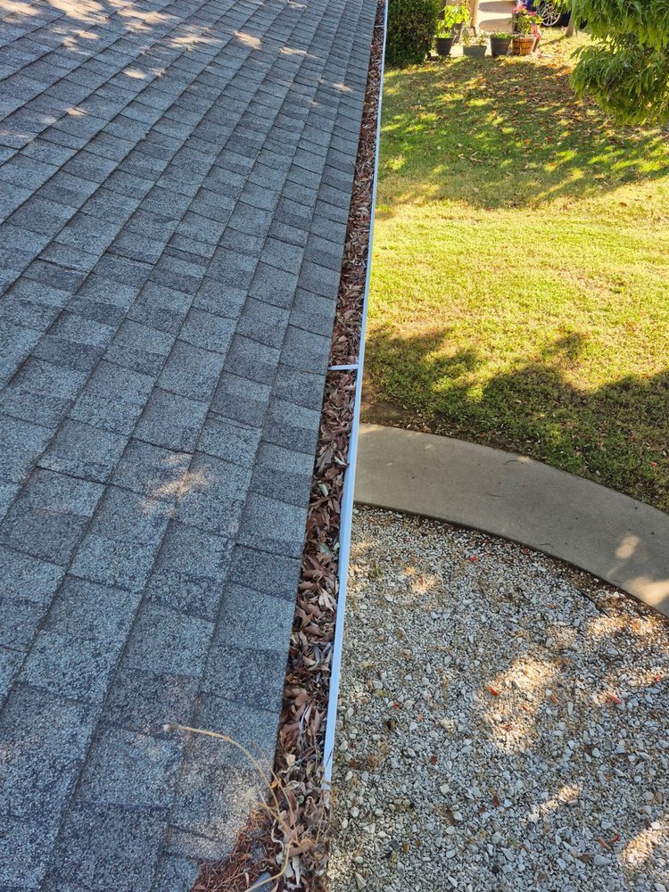 Slide of Cleaning Gutters Service