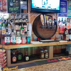 Poor Richard's Bar - Behind bar