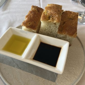 Orso Trattoria - Homemade focaccia w/balsamic vinegar & olive oil - Italian Near Me - Jasper, Alberta Orso Trattoria - Homemade focaccia w/balsamic vinegar & olive oil - Italian Near Me - Jasper, Alberta