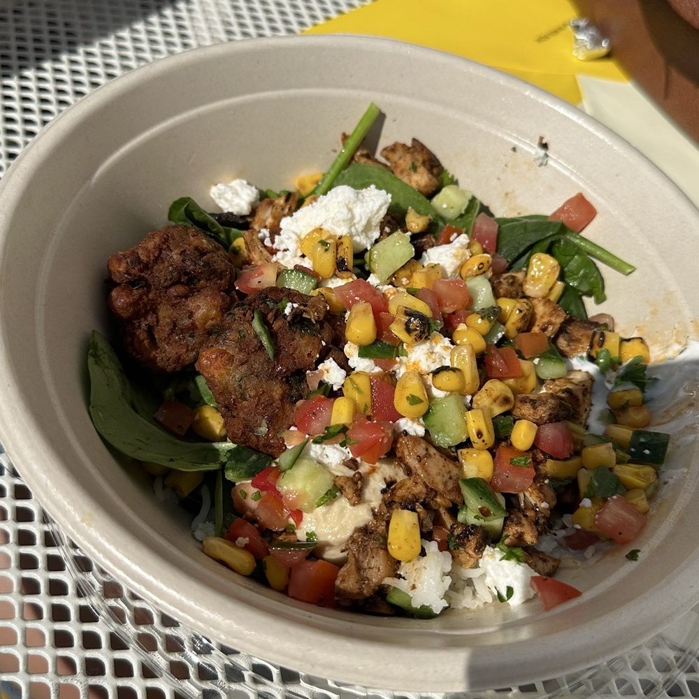 CAVA - Build your own with chicken and falafel on a bed of spinach and basmati rice. - Mediterranean Near Me - Temecula, California