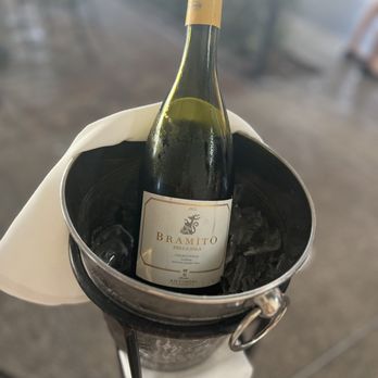 Carpaccio - a bottle of wine in a bucket - Italian Near Me - Bal Harbour, Florida