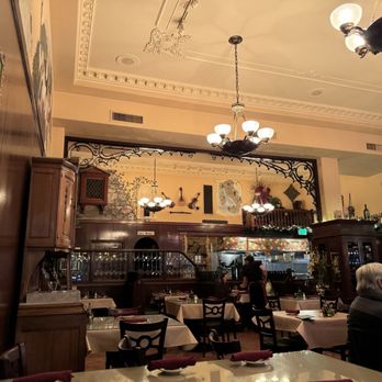 Italian Kitchen - people sitting at tables in a restaurant - Italian Near Me - Spokane, Washington Italian Kitchen - people sitting at tables in a restaurant - Italian Near Me - Spokane, Washington