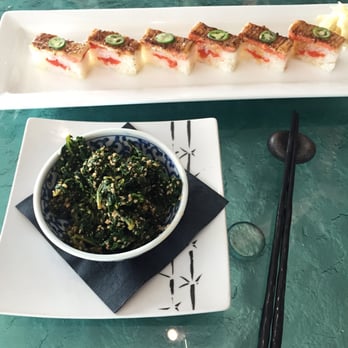 Miku - Kale salad (kind of weird) and their signature pressed salmon sushi. - Japanese Near Me - Vancouver, British Columbia
