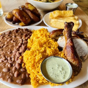 Brasa Rotisserie - Rotisserie Chicken plate with rice & beans, Plantains, Crispy Yuca w/ Citrus & Garlic Mojo. - Southern Near Me - Saint Paul, Minnesota Brasa Rotisserie - Rotisserie Chicken plate with rice & beans, Plantains, Crispy Yuca w/ Citrus & Garlic Mojo. - Southern Near Me - Saint Paul, Minnesota