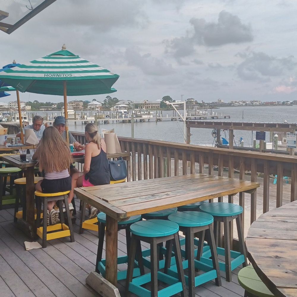 Tiki & Raw Bar - Patio seating - Tiki Bars Near Me - Orange Beach, Alabama Tiki & Raw Bar - Patio seating - Tiki Bars Near Me - Orange Beach, Alabama