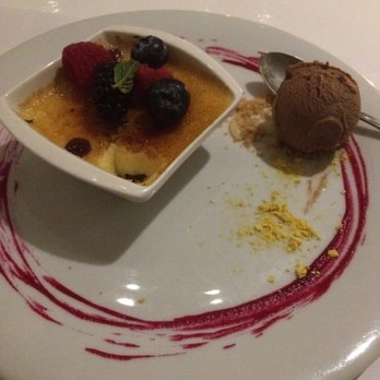 La Leche - Creme Brûlée with Nutella ice cream, with a bite already missing lol - Signature Cuisine Near Me - Puerto Vallarta, JAL