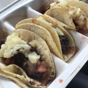 Moink Bbq & Catering - Pastor dino rib tacos, slow cooked pork with a pineapple salsa. - Barbeque Near Me - Youngstown, Ohio Moink Bbq & Catering - Pastor dino rib tacos, slow cooked pork with a pineapple salsa. - Barbeque Near Me - Youngstown, Ohio