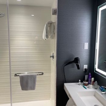 AC Hotel by Marriott Denver Downtown - Bathroom with nice shower - Hotels Near Me - Denver, Colorado AC Hotel by Marriott Denver Downtown - Bathroom with nice shower - Hotels Near Me - Denver, Colorado
