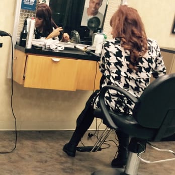 Supercuts - Here's a worker styling her hair as the customers add up in the lobby.  Maybe you can do this in the back. - Hair Salons Near Me - LONG BEACH, California