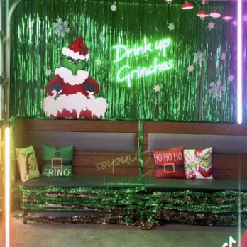 Waterside District - Grinch Selfie wall with seating - Sports Bars Near Me - Norfolk, Virginia Waterside District - Grinch Selfie wall with seating - Sports Bars Near Me - Norfolk, Virginia