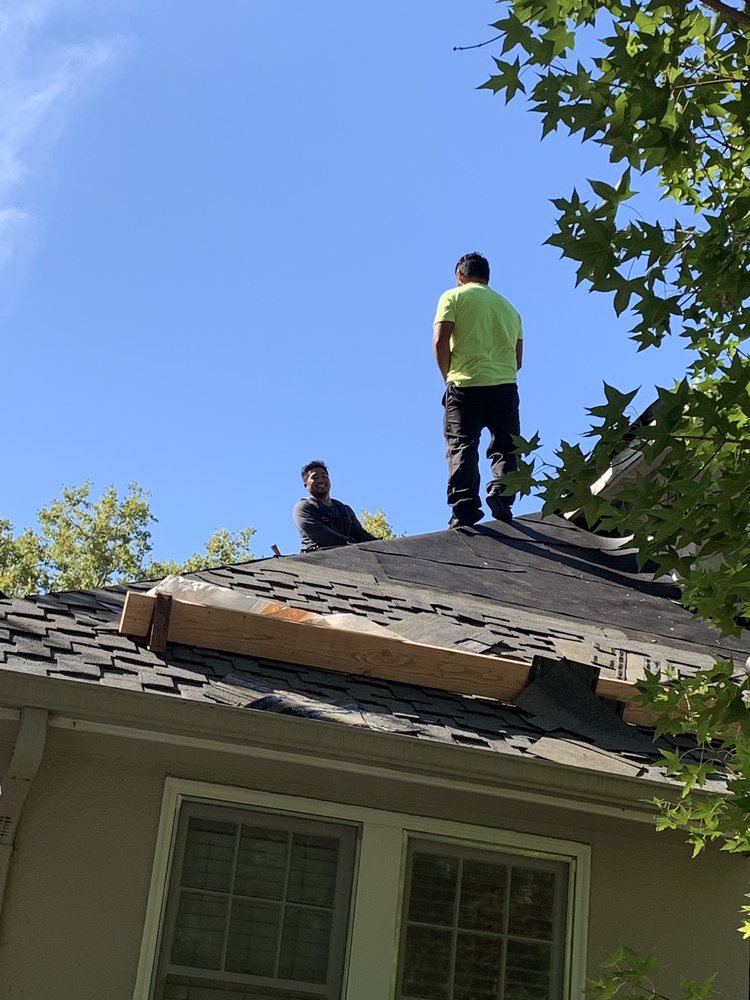 Slide of Signature Roofing