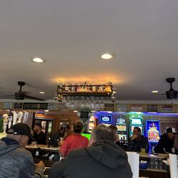 Kross Inn - A look towards the bar from the window tables.  You can see some slot machines in the back.