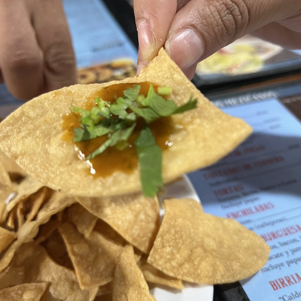 Tacos Kissi - A fried corn tortilla with one of their many delicious salsas and a pinch of fresh celantro - Tex-Mex Near Me - Laredo, Texas Tacos Kissi - A fried corn tortilla with one of their many delicious salsas and a pinch of fresh celantro - Tex-Mex Near Me - Laredo, Texas