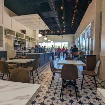 Parlor Doughnuts - Seating by the restroom looking towards the front - Donuts Near Me - Nassau Bay, Texas Parlor Doughnuts - Seating by the restroom looking towards the front - Donuts Near Me - Nassau Bay, Texas