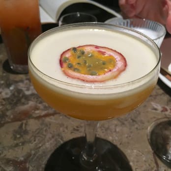 COYA - Ron Jeremias w/ passionfruit slice - Peruvian Near Me - London, XGL COYA - Ron Jeremias w/ passionfruit slice - Peruvian Near Me - London, XGL