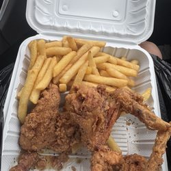 America's Best Wings - Dry fries and chicken sitting in oil