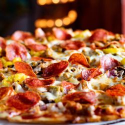 Club Paradise - Full photo of the most amazing pizza in Angola.