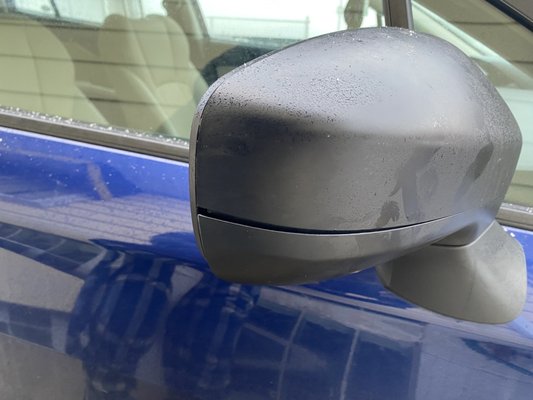 Photo of The Plain Dealer - Cleveland, OH, US. This is what the delivery person did. They hit my passenger side mirror, which knocked the cover out of alignment.