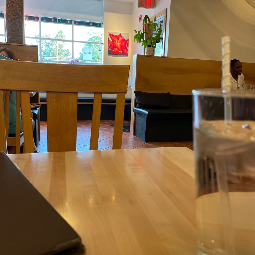 Heng's Thai Cuisine - a laptop and a glass of water - Thai Near Me - Springfield, Pennsylvania Heng's Thai Cuisine - a laptop and a glass of water - Thai Near Me - Springfield, Pennsylvania