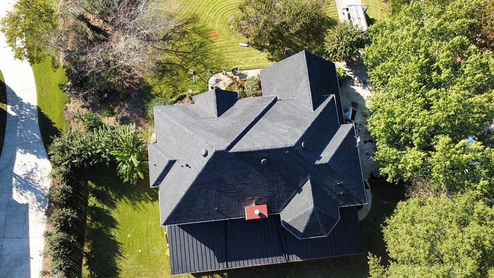 Slide of Denali Roofing and Restorations