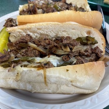 Tony's Sutton Pizza Restaurant - Steak Bomb with Onion Rings - Pizza Near Me - Sutton, Massachusetts Tony's Sutton Pizza Restaurant - Steak Bomb with Onion Rings - Pizza Near Me - Sutton, Massachusetts