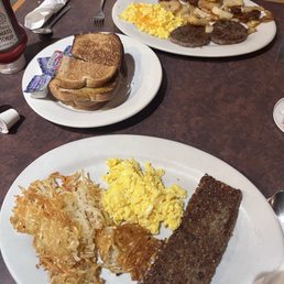 Hash Browns, scrambled eggs, Goetta, and rye toast with jam Hash Browns, scrambled eggs, Goetta, and rye toast with jam