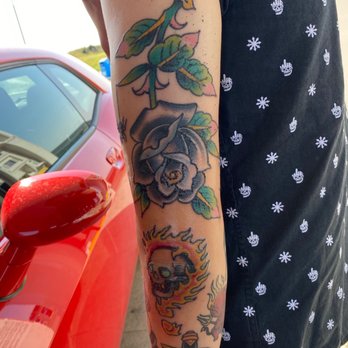 Elm Street Tattoo - David Steed did the rose and the burning question with the skull. We recommend him he was very caring and creative. - Tattoo Near Me - Dallas, Texas