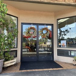 Rockville Kitchen + Bar - Front door, pretty inside large format beautiful local landscape photos