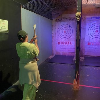 Axe Throw - Axe throwing in progress - Axe Throwing Near Me - San Diego, California Axe Throw - Axe throwing in progress - Axe Throwing Near Me - San Diego, California