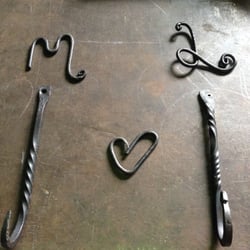 Earthen Metals - Wall hooks made at our first attempt at blacksmithing! We decided to use the hooks as leash hooks for our dogs Mishka and Lyra