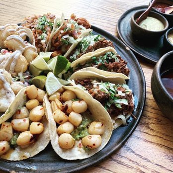 ConMi Taco - a plate of tacos and sauces - Mexican Near Me - Calgary, Alberta ConMi Taco - a plate of tacos and sauces - Mexican Near Me - Calgary, Alberta