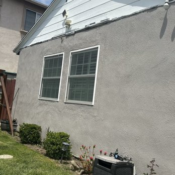 Patch Tech - Before the siding removal and patch job. - Stucco Services Near Me