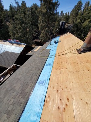 Shingle Roof Replacement in Kennedy Meadows, CA - A complete roof tear-off and replacement is essential for protecting your home in Los Angeles and surrounding areas from sun exposure, heavy winds, and seasonal rains. Our expert team starts by removing old shingles and inspecting the roof deck for any damage. If the existing plywood is deteriorated, we replace it with high-quality sheathing to create a strong, stable foundation. Next, we install premium synthetic underlayment, adding a waterproof barrier that enhances durability and energy efficiency. This crucial step prevents leaks and moisture buildup, ensuring long-term protection for homes in Los Angeles, San Fernando Valley, Santa Clarita Valley, and beyond.

For this project in Kennedy Meadows, CA, we installed Malarkey Willow Wood shingles for a superior finish, designed for impact resistance, flexibility, and energy efficiency. These high-performance shingles provide long-lasting protection against heat, rain, and wind while enhancing your home’s curb appeal. With expert craftsmanship and top-tier materials, we ensure your new roof is built to withstand Southern California’s demanding climate, offering durability, beauty, and peace of mind for years to come.