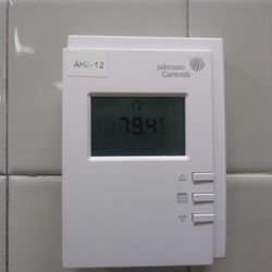 Hercules Fitness Center - It's waaaay way way too hot in here! Pic is of themostat in women's locker room, just below the large cooling fan.