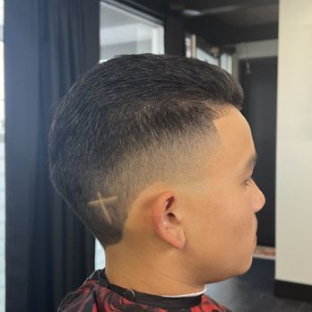 Barber Lounge - Slick back trim with a taper, line up, & design. By Sergio Miranda - Barbers Near Me - San Leandro, California Barber Lounge - Slick back trim with a taper, line up, & design. By Sergio Miranda - Barbers Near Me - San Leandro, California