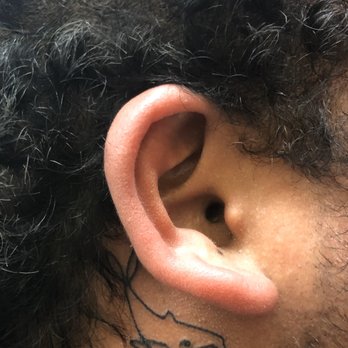 Iron Tiger Tattoo - Whale behind left ear - Piercing Near Me - Columbia, Missouri Iron Tiger Tattoo - Whale behind left ear - Piercing Near Me - Columbia, Missouri