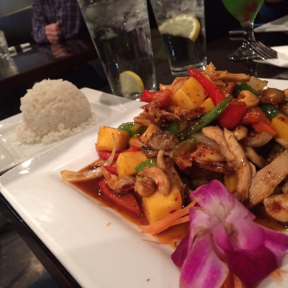 Mai Thai - Chicken Mango entree: "Chicken stir-fried with mango, yellow onions, bell pepper, mushrooms, carrots, celery, and cashews" - Thai Near Me - Omaha, Nebraska Mai Thai - Chicken Mango entree: "Chicken stir-fried with mango, yellow onions, bell pepper, mushrooms, carrots, celery, and cashews" - Thai Near Me - Omaha, Nebraska